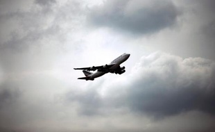 TO GO WITH AFP STORY BY DELPHINE TOUITOU - A file picture taken on June 11, 2013 shows an Air France Boeing 747 plane taking off from Roissy Charles de Gaulle international airport, in Roissy-en-France, outside Paris. AFP PHOTO / FRED DUFOUR