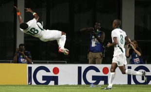 Abdelkader Keita fête son but pour la Côte d'Ivoire face à la Guinée lors du quart de finale de la Coupe d'Afrique des nations, au Ghana, le3 février 2008.