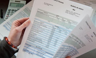 Illustration de fiches de salaire.