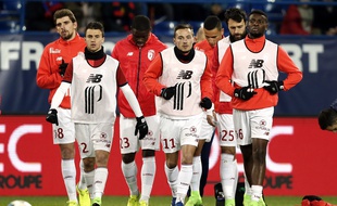 Éric Bauthéac (chasuble blanc, au centre), ici à l'échauffement avant Caen-Lille, le 18 février 2017.
