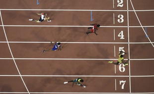 Jamaica's Usain Bolt celebrates as he crosses the finish line to win the menís 200m final at the World Athletics Championships at the Bird's Nest stadium in Beijing, Thursday, Aug. 27, 2015. (AP Photo/David J. Phillip) /WTC675/124976258494/1508271516