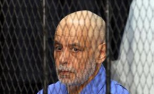 Le dernier Premier ministre de Mouammar Kadhafi, Baghdadi al-Mahmoudi, au tribunal le 18 février 2014 à Tripoli