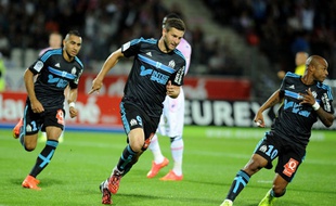 André-Pierre Gignac célèbre son but face à Evian, dimanche 14 septembre 2014.