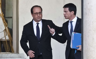 French President Francois Hollande, left, and French Prime Minister Manuel Valls talk to each other after the weekly cabinet meeting at the Elysee Palace in Paris, Wednesday, Feb. 10, 2016. French foreign minister Laurent Fabius says he is to leave the government to be named at the head of the Constitutional Council, Frances top court making sure bills are compliant with the Constitution. (AP Photo/Michel Euler)/MEU104/278849287779/1602101216