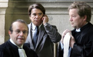 L'ex-ministre, 70 ans, qui a connu la gloire puis la prison avant de revenir aux affaires grâce à cette décision polémique qui lui avait octroyé plus de 400 millions d'euros en 2008, a dans la foulée été libéré sous contrôle judiciaire, avec interdiction de communiquer avec certains des protagonistes du dossier.