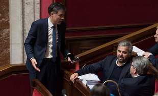 Olivier Faure discutant avec Alexis Corbière et Jean-Luc Mélenchon à l'Assemblée nationale. (archives)