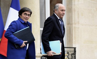 La ministre des sports Valérie Fourneyron et le ministre des affaires étrangères, Laurent Fabius, lors d'une réunion sur la diplomatie du sport français le 15 janvier 2014 à Paris