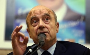 Alain Juppé en meeting avec François Fillon à Eysines, près de Bordeaux, le 6 mars 2014.
