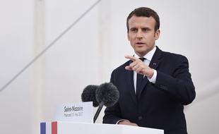 French President Emmanuel Macron delivers a speech during the delivery ceremony of the MSC Meraviglia cruise ship on May 31, 2017 at the STX shipyard of Saint-Nazaire, western France.
With a capacity of 65700 passengers and 1550 crew members, the MSC Meraviglia is the biggest cruise ship in Europe. / AFP PHOTO / JEAN-SEBASTIEN EVRARD