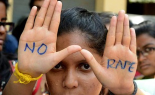 Des étudiants lors d'une manifestation contre le viol, à Hyderabad, en Inde, le 13 septembre 2013
