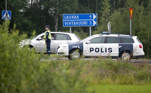 Des voitures de police à Laukaa, en Finlande, le 10 juillet 2013.