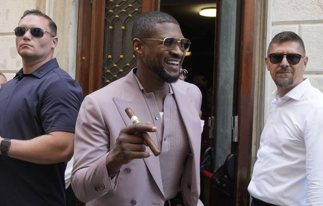 Usher, toujours collé à son cigare.