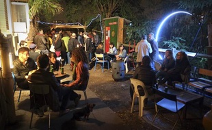 Dans le squat d'artistes Le Shakirail avec le collectif Curry Vavart, le 12 septembre 2013, rue Riquet à Paris.