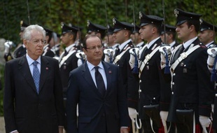 Les dirigeants français et italien François Hollande et Mario Monti se sont présentés mardi à Rome en "gardiens des décisions" prises au sommet européen de fin juin pour alléger les tensions sur les marchés obligataires italiens et espagnol et relancer la croissance en Europe.
