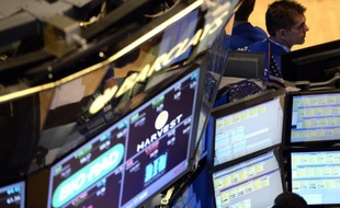 Un trader à la Bourse de New York le 16 octobre 2014