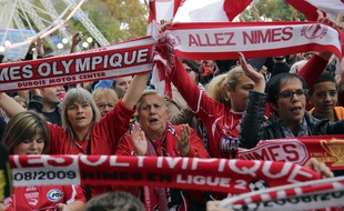Privés de Ligue 1 depuis 1992-1993, les supporters de Nîmes Olympique retrouveront l'élite avec quasi-certitude en cas de succès vendredi.