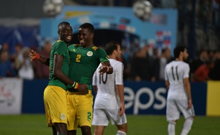 Papy Djilobodji, tout sourire après le succès (0-1) en Egypte, est qualifié pour la prochaine CAN. AFP PHOTO / KHALED DESOUKI