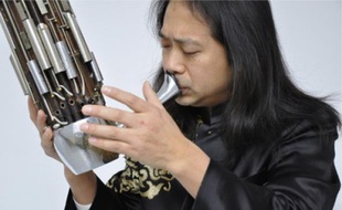 Brunch musical au Musée Dauphinois avec le musicien Wuang et son sheng.
