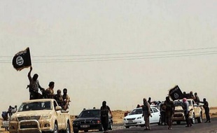 Image téléchargée du site jihadiste Welayat Salahuddin le 14 juin 2014 montrant des militants du groupe Etat islamique à bord de véhicule dans un endroit non identifié dans la région de Salaheddine, en Irak