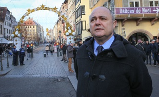 Strasbourg le 20 décembre 2016. Bruno Le Roux, Ministre de l'intérieur au marché de Noël de Strasbourg, en compagnie de Roland Ries et de Robert Herrmann.
