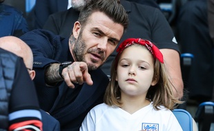 L'ancien footballeur David Beckham et sa fille Harper pendant la coupe du monde de football