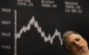 Un trader à la bourse de Francfort, le 20 août 2007