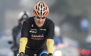 Le secrétaire d'Etat John Kerry lors d'une promenade à vélo le 16 mars 2015 à Lausanne, pendant une pause dans les discussions sur le nucléaire iranien
