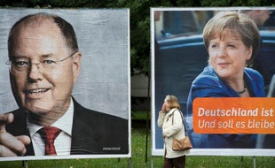 La chancelière Angela Merkel a dressé mardi le portrait d'une Allemagne forte, tandis que son rival social-démocrate Peer Steinbrück l'a accusé d'avoir accru les inégalités, durant leur ultime confrontation directe au parlement avant les législatives du 22 septembre