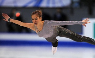 L'Italienne Carolina Kostner a remporté pour la première fois de sa carrière la finale dames du Grand Prix ISU de patinage artistique, samedi à Québec, alors que le Canadien Patrick Chan a conservé le titre qu'il avait enlevé à Pékin l'an dernier.