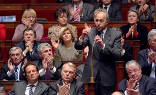 French former socialist Prime Minister Laurent Fabius poses a question duringt the weekly session of questions to the government on January 13, 2009 at the French National Assembly in Paris. Foreground are French former Socialist Party First Secretary Francois Hollande (L) and President of the Socialist Party group Jean-Marc Ayrault (2ndl).
AFP PHOTO PATRICK KOVARIK