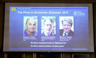 Les portraits des lauréats du prix Nobel d'économie affichés à l'Académie des sciences à Stockholm le 14 octobre 2013