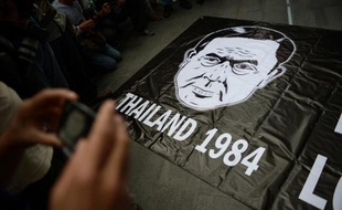 Caricature du chef de la junte de la junte thaïlandaise, le général Prayut Chan-o-Cha, faisant référence au roman "1984" sur le totalitarisme de George Orwell, dans un centre commercial de Bangkok, le 1er juin 2014