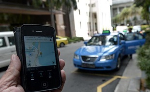 L'application Uber sur un smartphone, le 10 octobre 2014 à Singapour