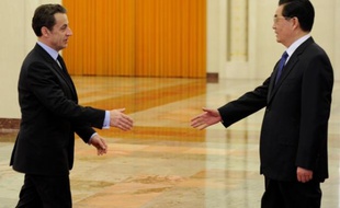 Nicolas Sarkozy rencontre le président chinois Hu Jintao le 30 mars 2011 à Pékin.