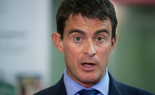 French Prime Minister Manuel Valls speaks on September 29, 2014 during a visit at the FEMTO-ST (Franche-Comte Electronique, Mecanique, Thermique et Optique - Sciences et Technologies) laboratory in the eastern French city of Besancon. AFP PHOTO / SEBASTIEN BOZON