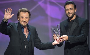 Johnny Hallyday et Maxim Nucci lors de la Cérémonie des 31es Victoires de la Musique en 2016.