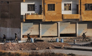 Des soldats soutenus par l'armée turque à Tal Abyad, en Syrie, le 13 octobre 2019.