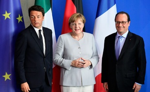 Le président François Hollande, la chancelière allemande Angela Merkel et le premier ministre italien Matteo Renzi après une conférence de presse à Berlin, le 27 juin 2016