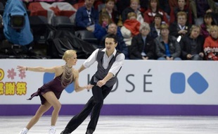 Les Russes Tatiana Volosozhar et Maxim Trankov ont pris un léger ascendant sur les grands maîtres de la catégorie couple, les Allemands Aliona Savchenko/Robin Szolkowy, quadruples champions du monde, à l'issue du programme court des Mondiaux-2013, mercredi à London (Canada).
