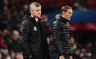Ole Gunnar Solskjaer, à gauche