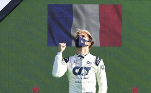 AlfaTauri driver Pierre Gasly of France celebrates on the podium after winning the Formula One Grand Prix at the Monza racetrack in Monza, Italy, Sunday, Sept.6 , 2020.