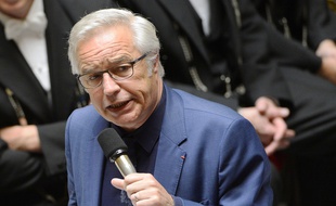 French Labor Minister Francois Rebsamen addresses the National Assembly on July 15, 2014 in Paris during a session of questions to the governement. AFP PHOTO / BERTRAND GUAY