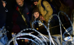 Des migrants à la frontière entre Hongrie et croatie, à Zakany le 16 octobre 2015