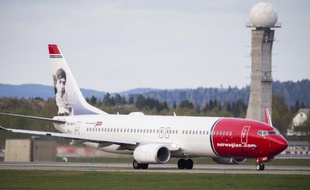 Un Boeing de la Norwegian Airline Shuttle sur le tarmac de l'aéroport d'Oslo, le 2 mai 2014