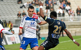 Réveillère avec le maillot de l'OL.