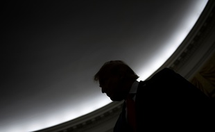 US President Donald Trump is seen during a Medal of Freedom ceremony for Lou Holtz in the Oval Office of the White House House on December 3, 2020, in Washington, DC.