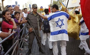 Des milliers de pèlerins chrétiens venus de l'étranger ont défilé jeudi à Jérusalem aux côtés de soldats et de travailleurs israéliens pour exprimer leur solidarité avec l'Etat juif.