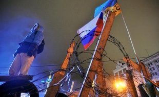 Le président ukrainien Viktor Ianoukovitch a promulgué vendredi de nouvelles lois visant à limiter les manifestations malgré les vives protestations de l'opposition et des pays occidentaux.