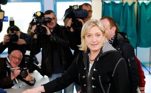 President of French far-right party Front national (FN) and former candidate for the 2012 French presidential election Marine Le Pen casts her ballot at a polling station in Henin-Beaumont, northern France, on May 6, 2012, as part of the presidential election second round vote. AFP PHOTO / DENIS CHARLET