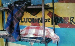 Reproduction d'une image du foyer d'accueil de "La grande famille", montrée le 16 juillet 2014 lors d'une conférence de presse à Mexico